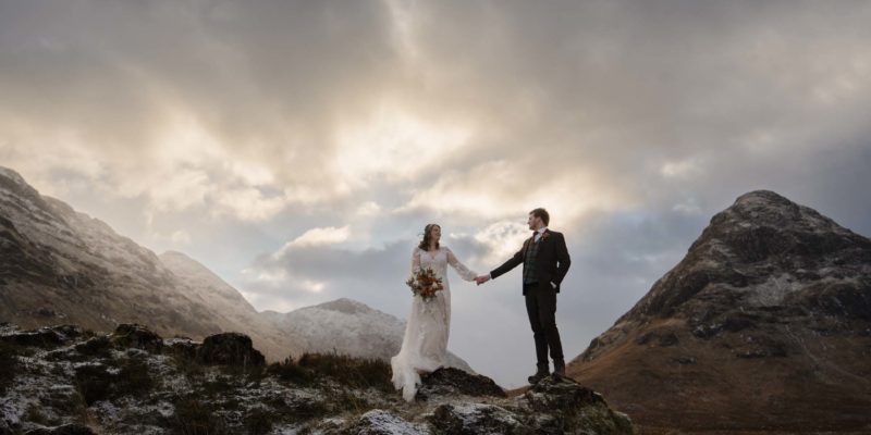 Couple wandering through Buachaille Etive Mòr on their elopement day