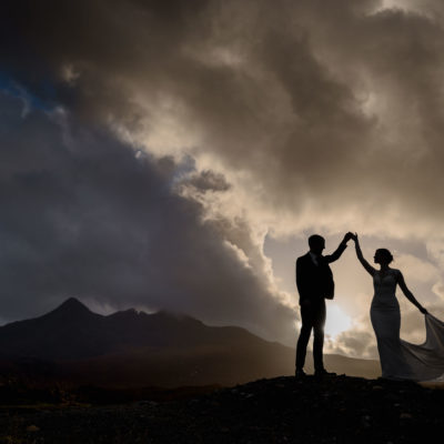 Bride and groom at sligachan and the Cuillin mountain range