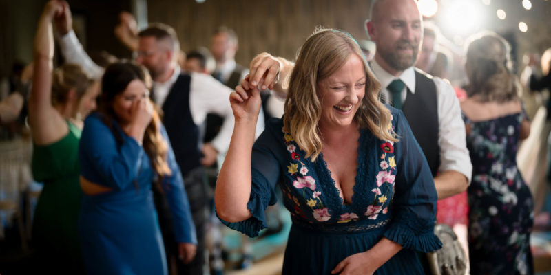 Lady laughing and having fun on the dance floor