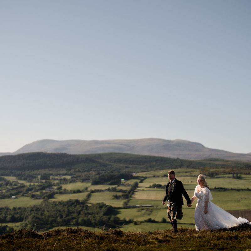 Couple wedding portraits on the Cats Back