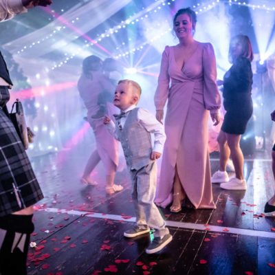 Page boy with bow tie dancing