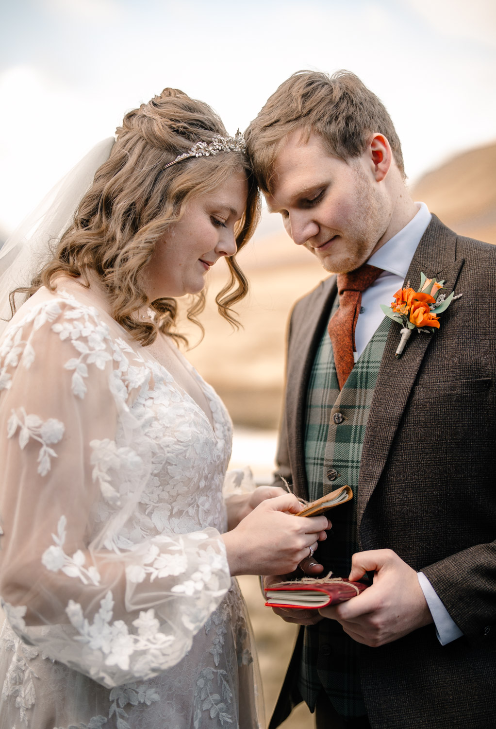 Bride and groom embracing after their ceremony