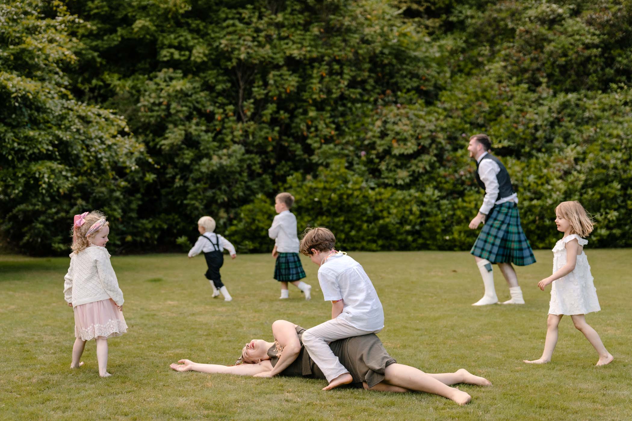 Wedding guests enjoying themselves in hotel garden